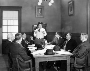 Board sitting around a table